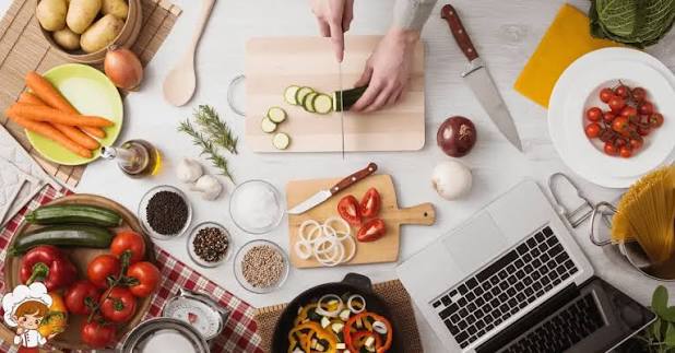 Illustrated food preparation station with fresh ingredients and utensils